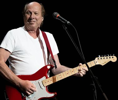 “Somebody handed me Mariah Carey’s record and said, ‘Would you sign this?’” How Adrian Belew ended up on a number one single without even knowing
