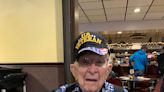 Bloomington American Legion Auxiliary presents local WWII veteran with quilt