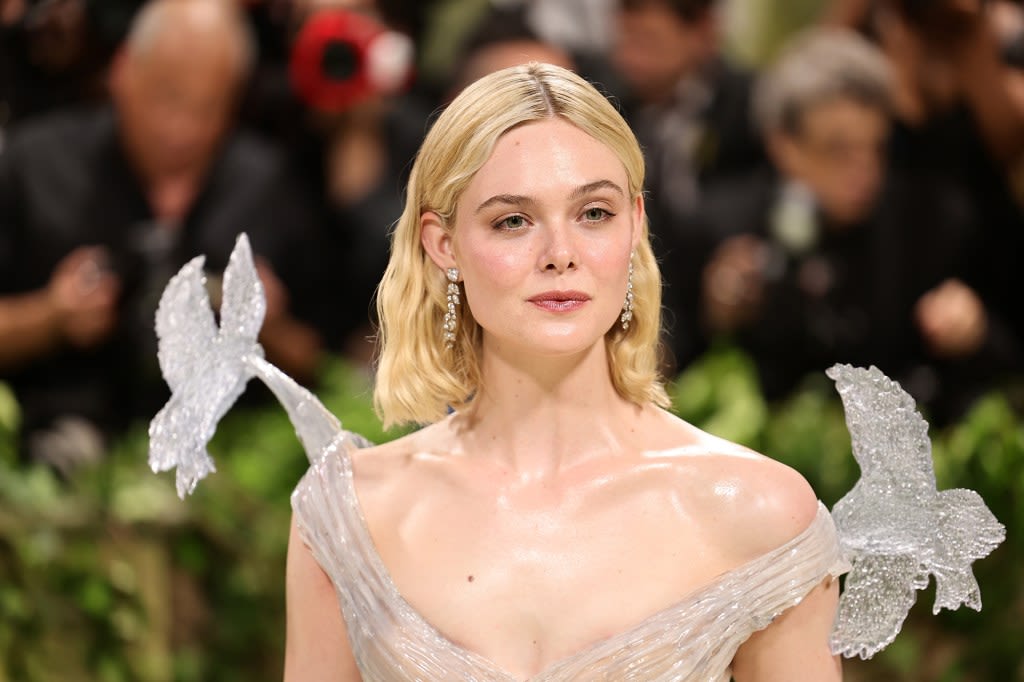 Elle Fanning Puts Icy Spin on Met Gala 2024’s Theme in ‘Crystal’ Balmain Gown With Sculpted Birds Holding Up the Sleeves