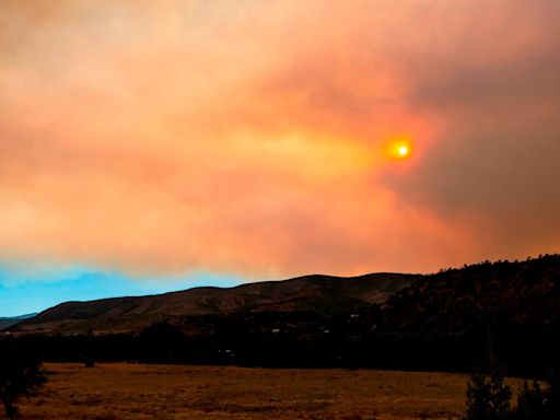 Wildfires turn deadly in New Mexico as firefighters also work to contain California blazes