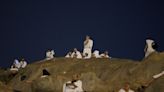 Muslim pilgrims converge at Mount Arafat for daylong worship as Hajj reaches its peak