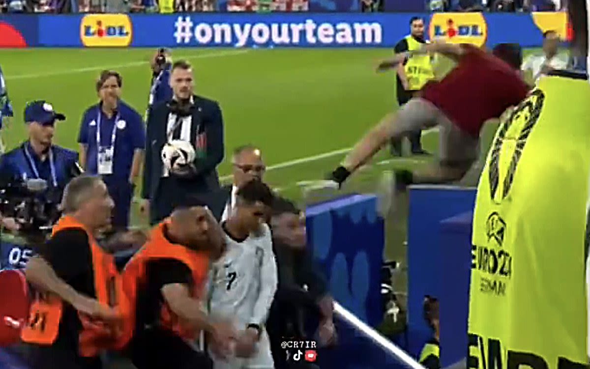 Watch: Cristiano Ronaldo saved by stewards as fan jumps from stands at Euro 2024