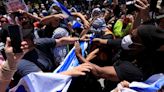 Pro-Palestinian protesters at UCLA tussle with Israel supporters