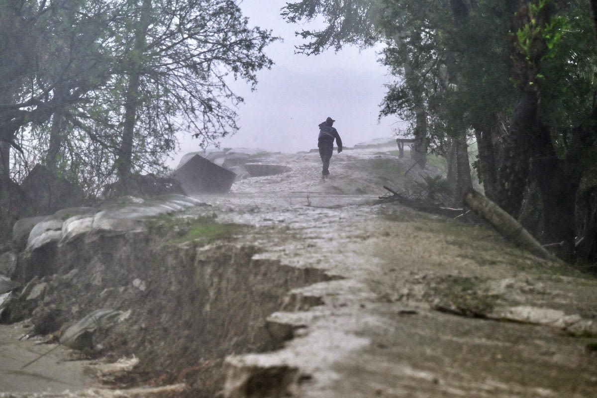 At least 16 killed as powerful cyclone hits Bangladesh and India