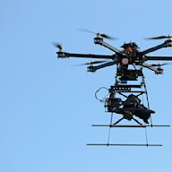 A drone with six rotors arranged in a hexagonal pattern. Offers greater stability and lifting capacity than quadcopters. Used for aerial photography, videography, and industrial inspections.