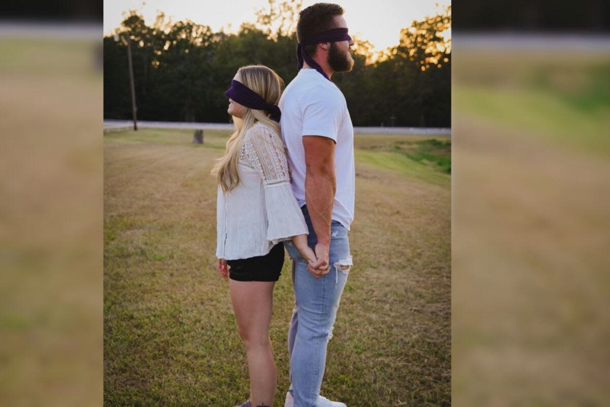 A couple who met through a blind date photo shoot are now engaged