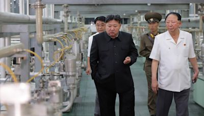 Pics show N.Korea's nuke facility for 1st time as Kim vows to boost arsenal