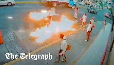 Watch: Fire-breather sets light to mariachi band in turf war