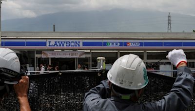 Swarmed with tourists, Japan town blocks off viral view of Mt. Fuji