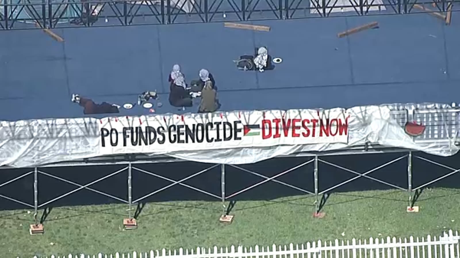 Pro-Palestinian protesters set up encampment on Pomona College graduation stage