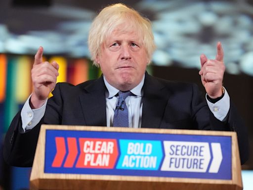 Boris Johnson makes surprise appearance at Tory rally as he urges voters not to abandon party for Reform UK