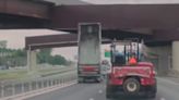 Raised bed of dump truck slams into overhead ramp on I-66