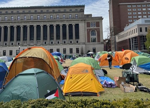 Anti-war protesters dig in as some schools close encampments after reports of antisemitic activity