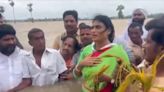 Congress leader YS Sharmila protests flood situation by wading waist-deep in water | Watch