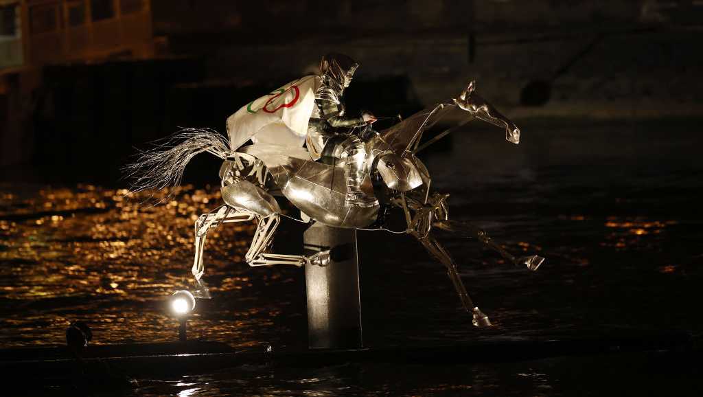 Watch a mesmerizing metal horse gallop down Seine River