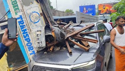 ... Materials For Metro Construction Overturns On Honda Car On Ghodbunder Road; Video Surfaces