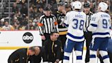 Referee taken off ice on stretcher after collision with Lightning’s Haydn Fleury