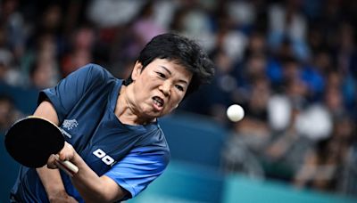 ‘Auntie’ Ni (61) beams as she bows out to Olympic table tennis champion