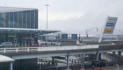 Fire breaks out at JFK Airport after escalator bursts into flames