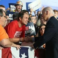 US President Joe Biden greets supporters at a campaign rally at Sherman Middle School in Madison, Wisconsin, on July 5, 2024