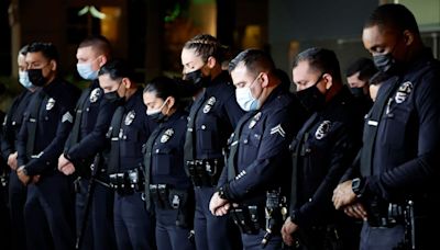 3 alleged gang members and an associate charged in the fatal shooting of an off-duty LAPD officer