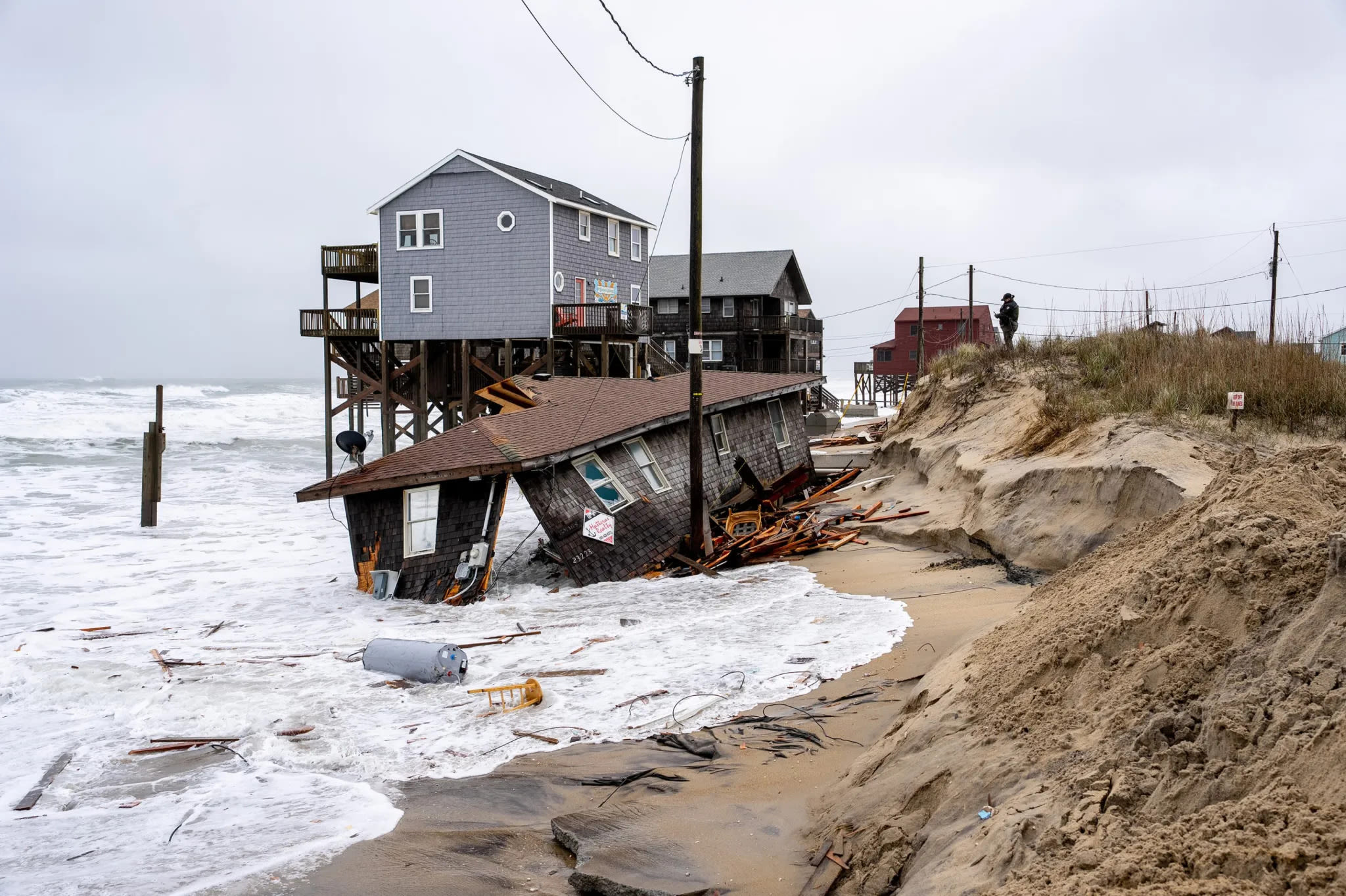 Outer Banks homes are collapsing due to climate change, but U.S. coastal property values are booming anyway