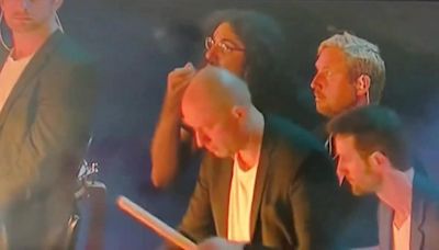 Man goes viral during Olympics closing ceremony for eating noodles on stage