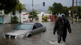 Pacific storm that unleashed coastal flooding pushes across Southern California into Arizona