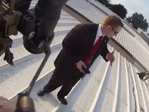 Newly Released Body Camera Footage Shows Law Enforcement on Roof Next to Trump Shooter’s Dead Body