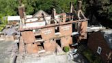 Two men arrested after fire at Crooked House pub