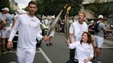 Journalist wounded in Israeli strike on Lebanon carries Olympic torch in France