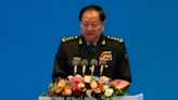 Chinese general takes a harsh line on Taiwan and other disputes at an international naval gathering