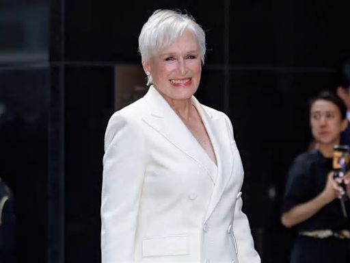 Glenn Close stuns at the Ralph Lauren Fall/Holiday fashion show... revealing on Instagram it's the same suit from 2019 SAG Awards 5 years ago