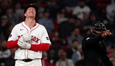 Garrett Cooper gets hit in wrist three at-bats into his Red Sox career, leaves Tuesday’s game injured - The Boston Globe