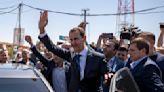 Syria's president grants amnesty, reduced sentences on anniversary of coup that put father in power