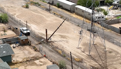 Power outages from monsoon storms leave workers scrambling to restore power