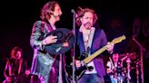 The Black Crowes' Rich Robinson Uses His Guitar to Help Boot Stage Crasher During Concert