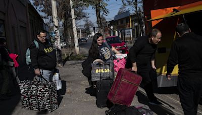 The 23-Hour Shopping Frenzy: Argentines Stampede Over Border