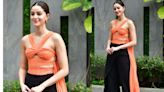 Ananya Panday Sizzles In Orange Knotted Top And Black Wide Leg Pants, See Pictures - News18