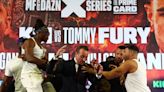 KSI vs Tommy Fury press conference features flipped tables and thrown cake as Logan Paul and Dillon Danis get heated