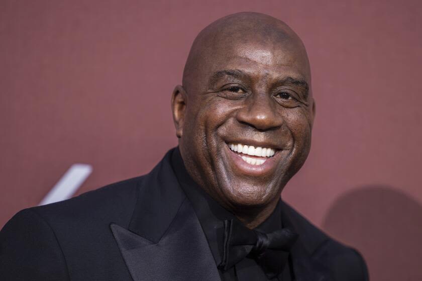 Magic Johnson buys stake in NWSL's Spirit: 'I got 14 world championships. I need 15'