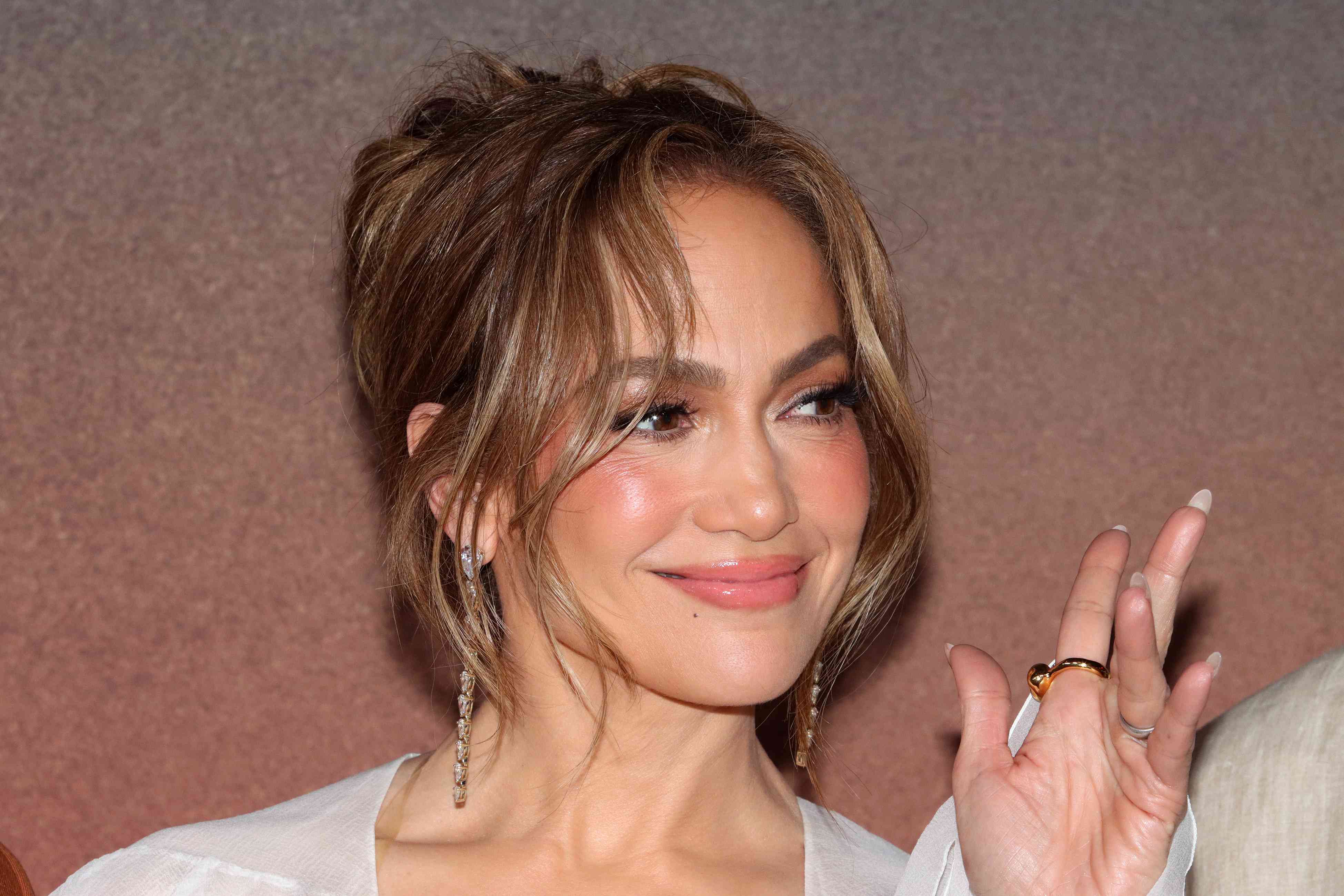 Jennifer Lopez Poses Next to "Don't F With JLo" Billboard Amid Ben Affleck Divorce Rumors