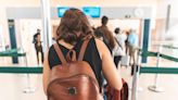 Woman Strips Naked, Walks Through Airport Security After Visa Issue | iHeart