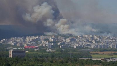 Firefighters die in Europe's 'hellish' heatwave as tourists told to stay indoors