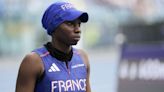 French sprinter will wear a cap during Olympic opening ceremony after hijab dispute is resolved