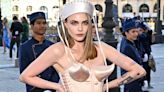 Cara Delevingne Goes Nautical in Bow-Adorned Sailor Hat and Cone Bra Corset Ahead of Hosting Vogue World: Paris