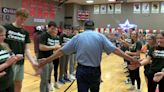 High school students celebrate custodian who received national best of the year award