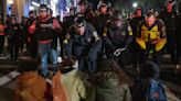 108 arrested at Emerson College protest, 4 Boston police officers hurt