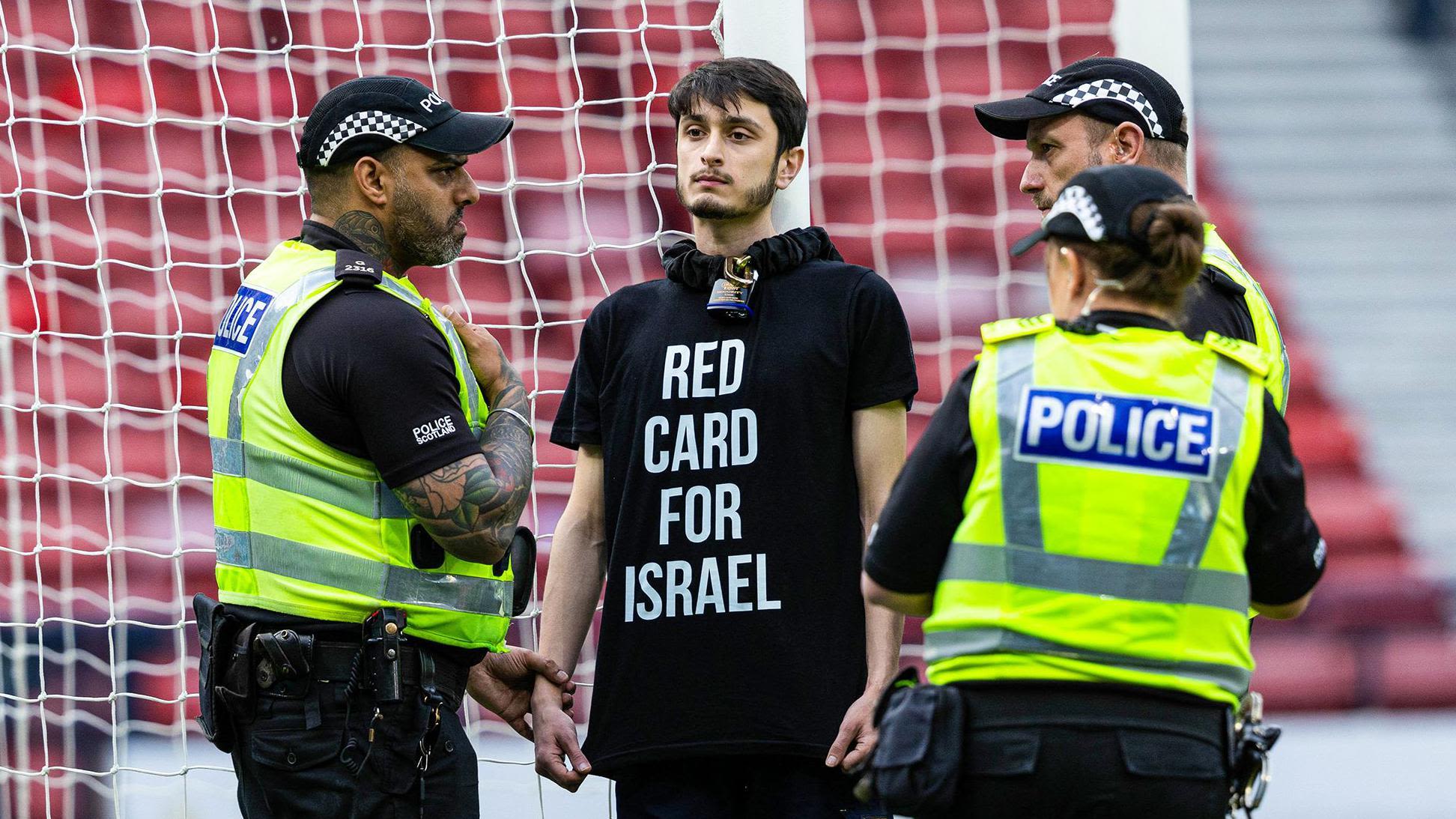 Protester chains himself to goalposts at Scotland v Israel match