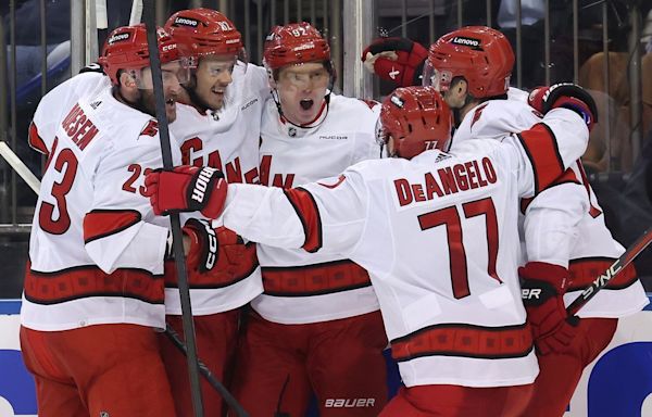 Canes score 4 in 3rd to beat Rangers, stay alive